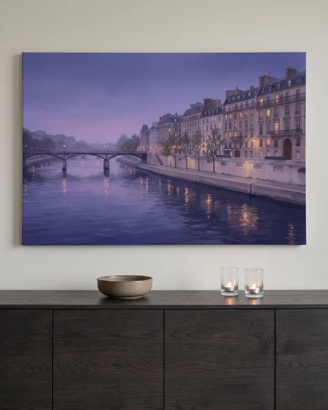 Leinwandbild – Stadt am Fluss im violetten Abendlicht