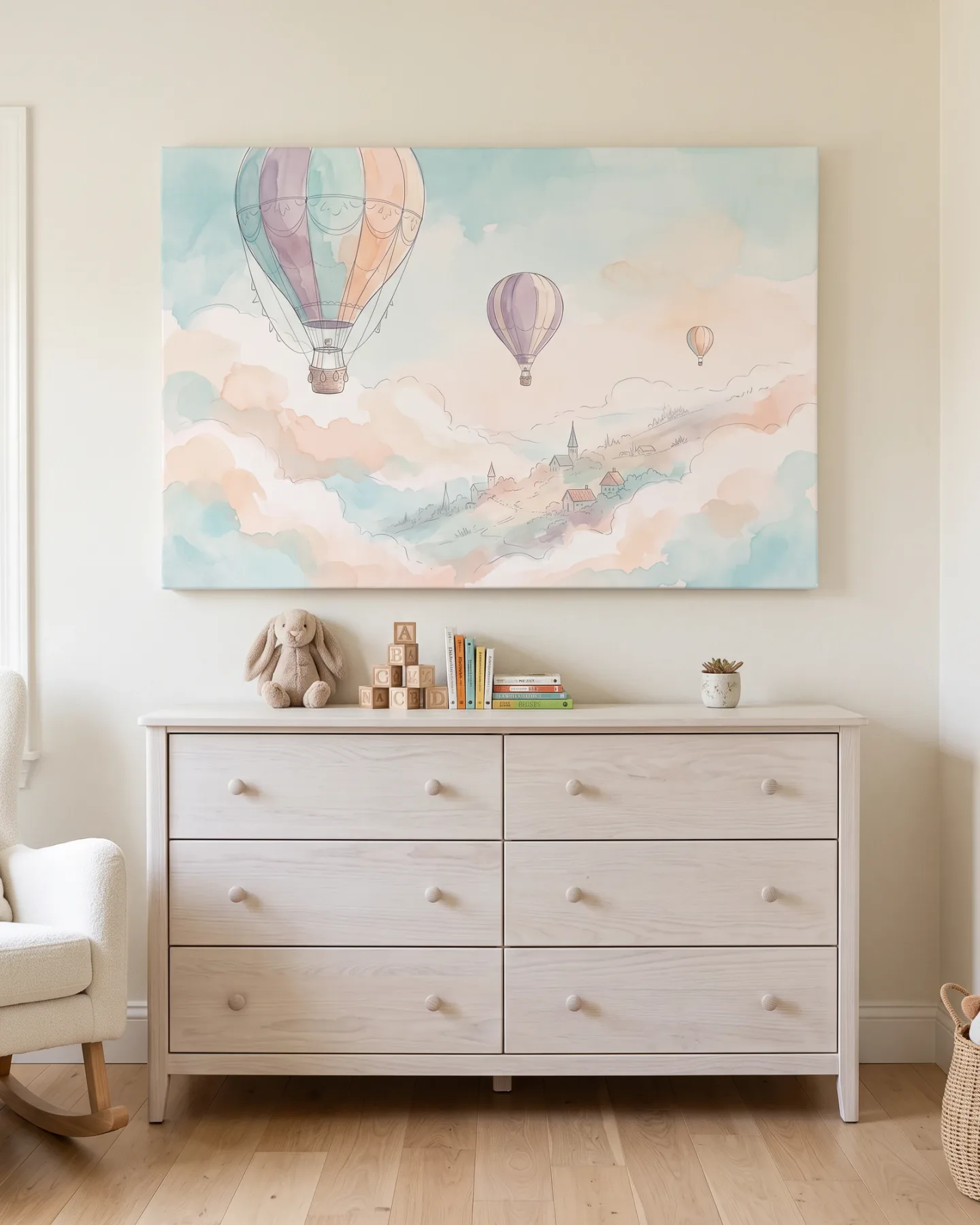 Leinwandbild – Heißluftballons über einem Dorf in den Wolken