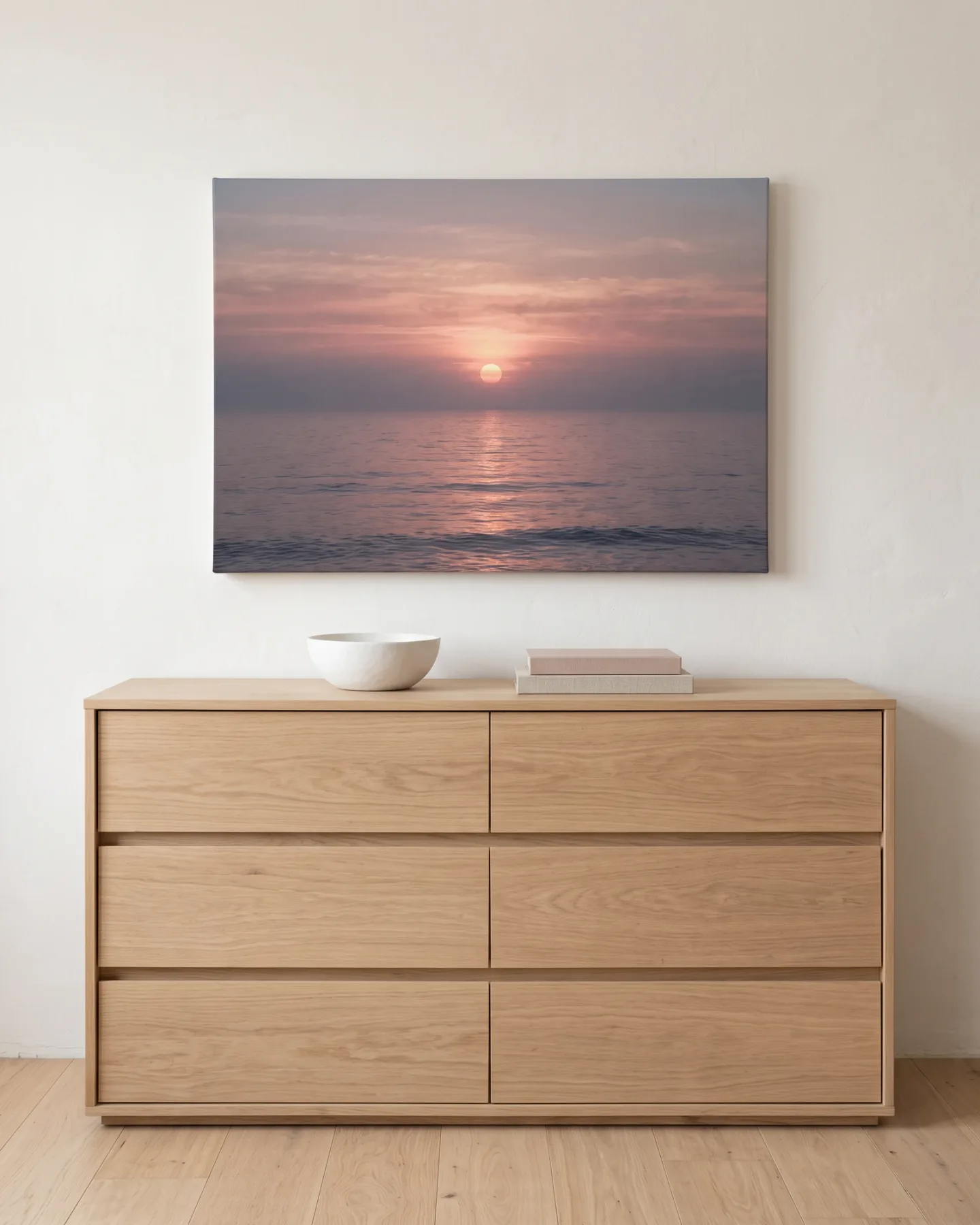 Leinwandbild – Runde Sonne über geradem rosa Horizont