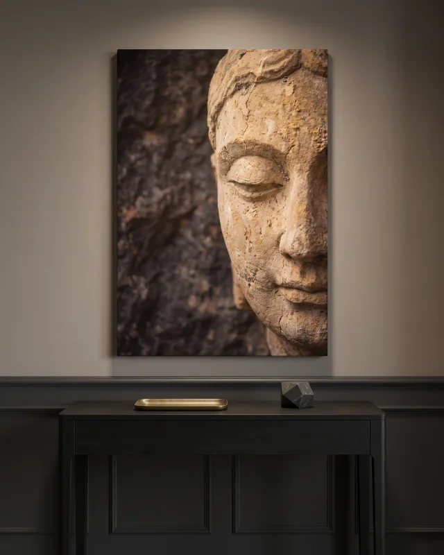 Canvas print – Weathered Stone Face with Closed Eyes