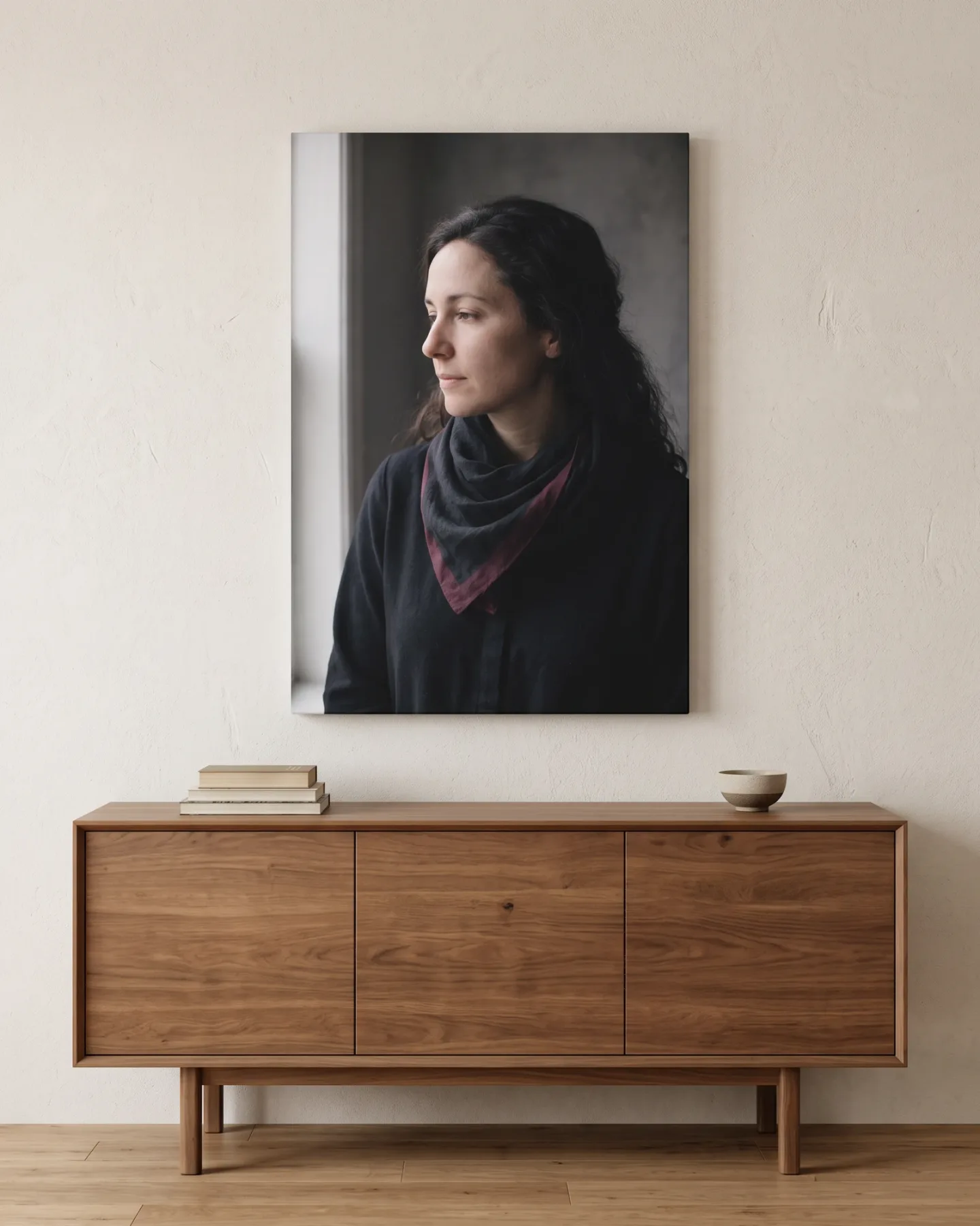 Canvas print – Thoughtful Portrait of a Woman in a Dark Scarf